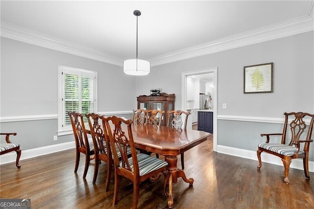 100 Barnard Pl, Atlanta, GA 30328 - dining room featuring dark wood-style flooring, ornamental molding, and baseboards