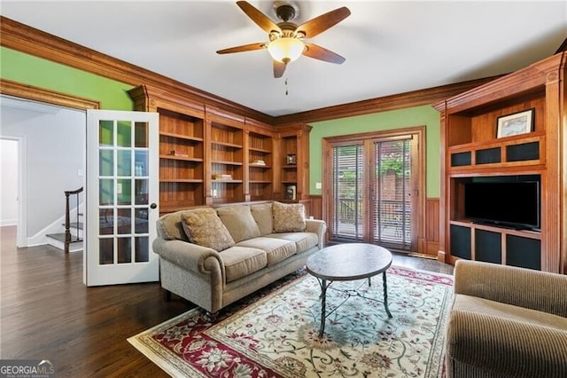 100 Barnard Pl, Atlanta, GA 30328 - living room featuring ornamental molding, dark wood-style floors, ceiling fan, and wainscoting
