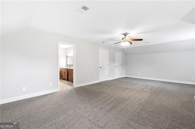 100 Barnard Pl, Atlanta, GA 30328 - interior space featuring baseboards, visible vents, a ceiling fan, and lofted ceiling