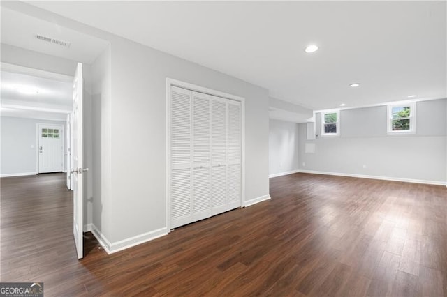100 Barnard Pl, Atlanta, GA 30328 - unfurnished bedroom with recessed lighting, a closet, baseboards, visible vents, and dark wood-type flooring