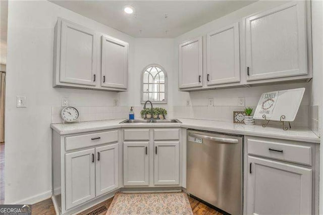 460 Broad St, Tallapoosa, GA 30176 - kitchen with dishwasher, light countertops, and wood finished floors