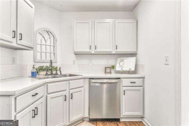 460 Broad St, Tallapoosa, GA 30176 - kitchen featuring dishwasher, light countertops, and wood finished floors