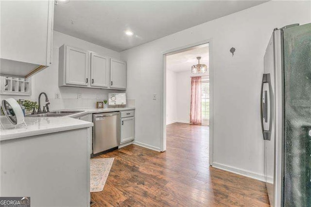 460 Broad St, Tallapoosa, GA 30176 - kitchen with stainless steel appliances, dark wood-style floors, and light countertops