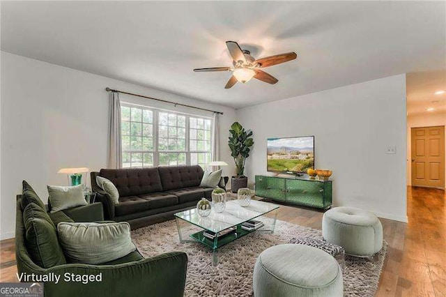 460 Broad St, Tallapoosa, GA 30176 - living room featuring ceiling fan and wood finished floors