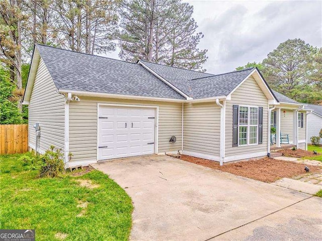 460 Broad St, Tallapoosa, GA 30176 - view of front of house with roof with shingles, driveway, and a garage