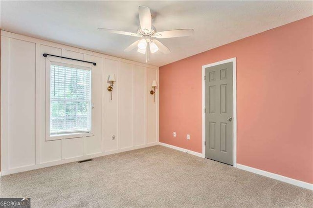 460 Broad St, Tallapoosa, GA 30176 - unfurnished room featuring carpet flooring and a ceiling fan