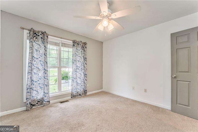 460 Broad St, Tallapoosa, GA 30176 - unfurnished room with carpet flooring and ceiling fan
