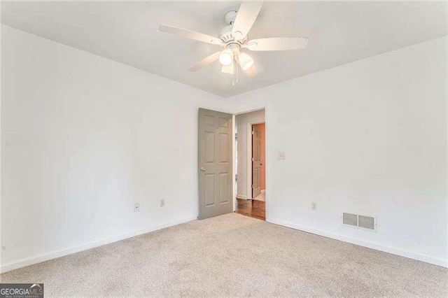460 Broad St, Tallapoosa, GA 30176 - empty room featuring carpet floors and ceiling fan