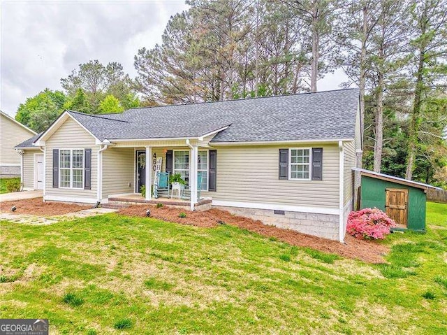 460 Broad St, Tallapoosa, GA 30176 - ranch-style house with a porch, a front yard, a shingled roof, and crawl space