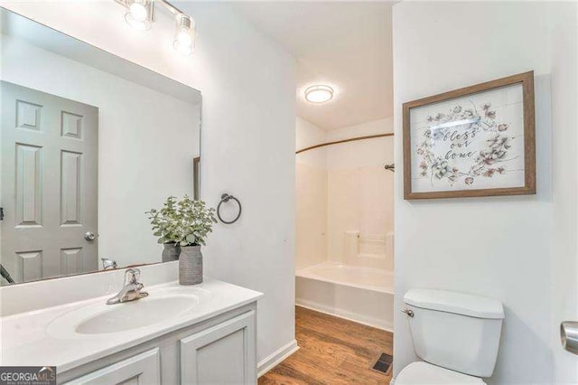 460 Broad St, Tallapoosa, GA 30176 - bathroom with vanity, wood finished floors, and  shower combination