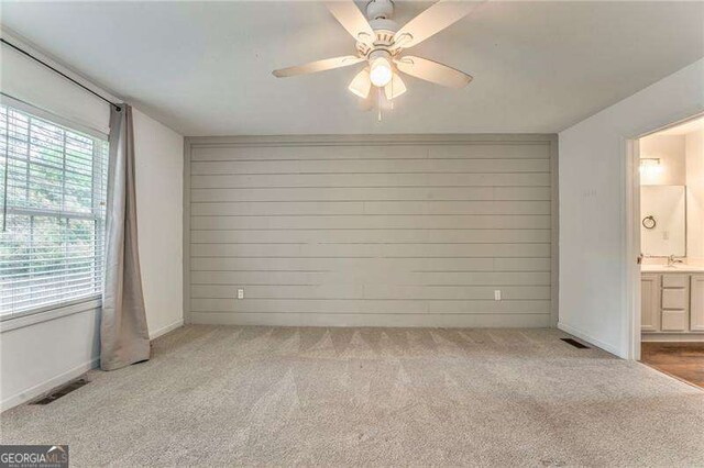 460 Broad St, Tallapoosa, GA 30176 - carpeted empty room featuring ceiling fan and a sink