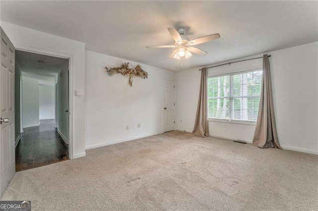 460 Broad St, Tallapoosa, GA 30176 - carpeted empty room featuring ceiling fan and baseboards