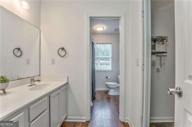460 Broad St, Tallapoosa, GA 30176 - full bathroom featuring vanity and wood finished floors