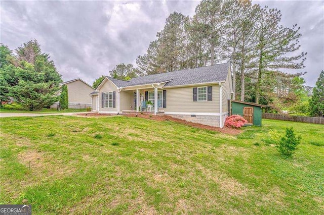 460 Broad St, Tallapoosa, GA 30176 - ranch-style house featuring a porch, crawl space, and a storage shed
