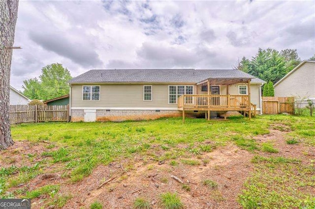 460 Broad St, Tallapoosa, GA 30176 - back of house featuring crawl space, a deck, and a fenced backyard