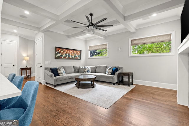 living room with ceiling fan, baseboards, wood finished floors, beamed ceiling, and coffered ceiling