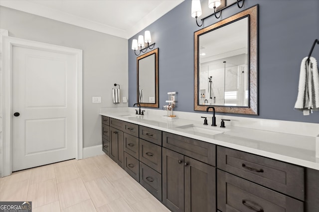 full bath featuring double vanity, a chandelier, a shower stall, and a sink