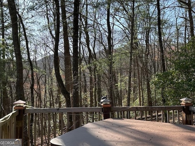 191 Mountain View Rd, Ellijay, GA 30540 - wooden terrace featuring a wooded view
