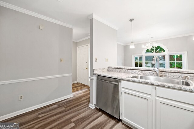3765 Windsor Cir, Clarkston, GA 30021 - kitchen with light countertops, dark wood-style flooring, dishwasher, a sink, and white cabinetry