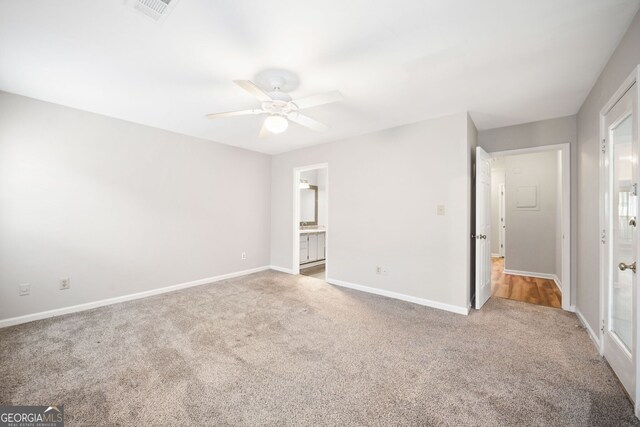 3765 Windsor Cir, Clarkston, GA 30021 - unfurnished bedroom with carpet, ceiling fan, ensuite bathroom, baseboards, and visible vents