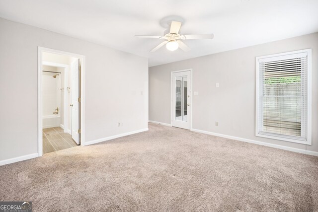 3765 Windsor Cir, Clarkston, GA 30021 - spare room featuring baseboards, ceiling fan, and carpet