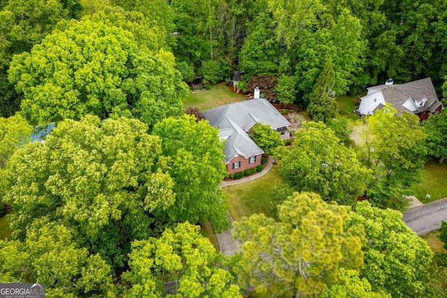 aerial view featuring a forest view