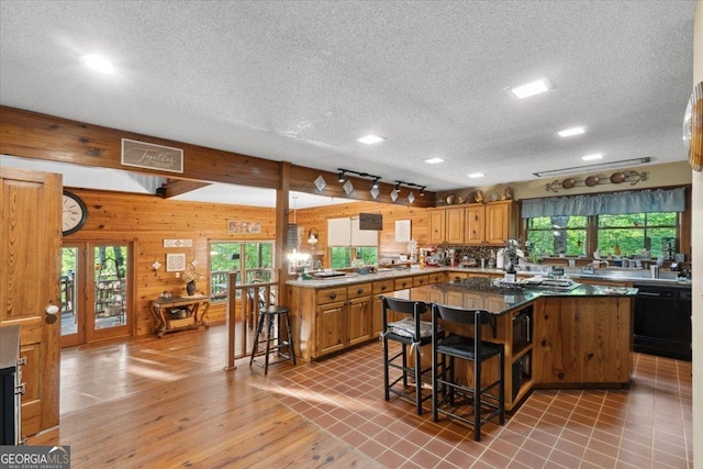 kitchen featuring visible vents, a textured ceiling, and plenty of natural light