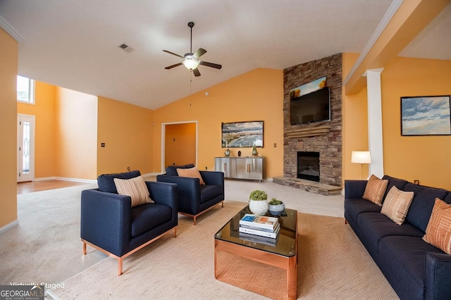 living room featuring light colored carpet, visible vents, baseboards, a fireplace, and a ceiling fan