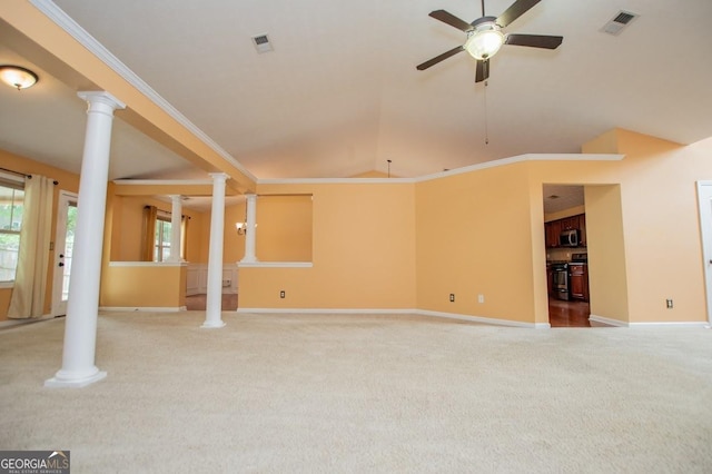 unfurnished living room with crown molding, ceiling fan, baseboards, carpet floors, and ornate columns