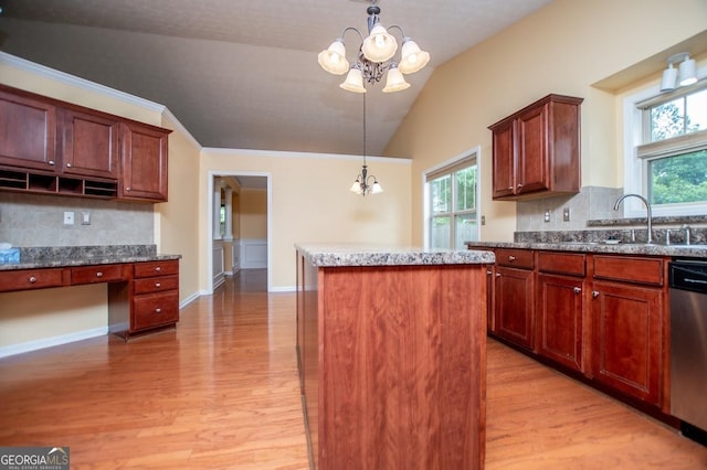 kitchen featuring stainless steel dishwasher, a sink, a kitchen island, and light wood-style floors