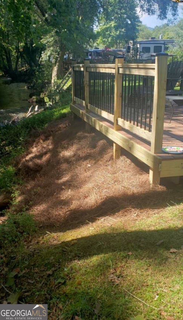 view of yard featuring a deck