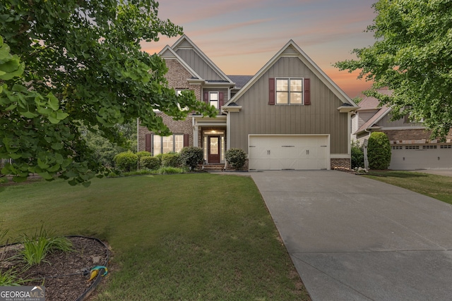 8275 Majors Ridge Way, Cumming, GA 30041 - craftsman inspired home with driveway, a front yard, a garage, and brick siding