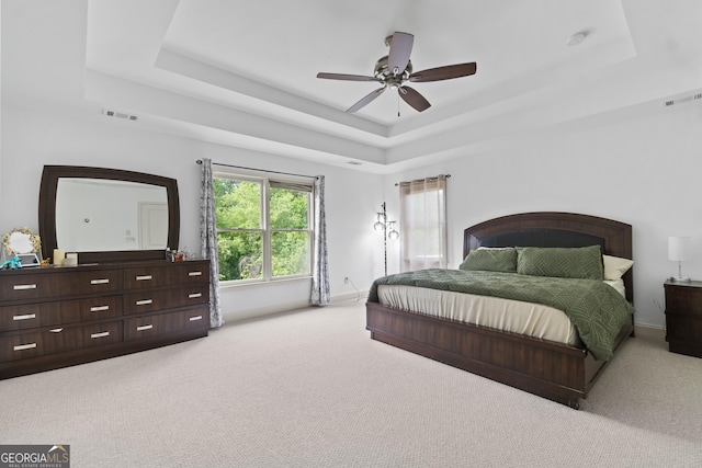 8275 Majors Ridge Way, Cumming, GA 30041 - bedroom featuring a raised ceiling, carpet flooring, baseboards, and a ceiling fan