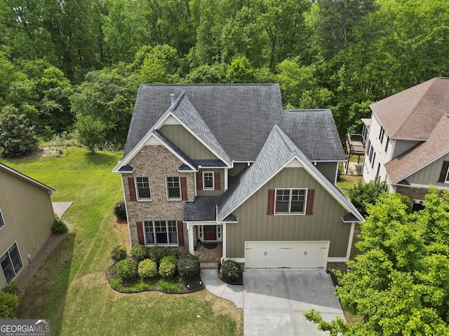 8275 Majors Ridge Way, Cumming, GA 30041 - craftsman inspired home with board and batten siding, a shingled roof, concrete driveway, and a front yard