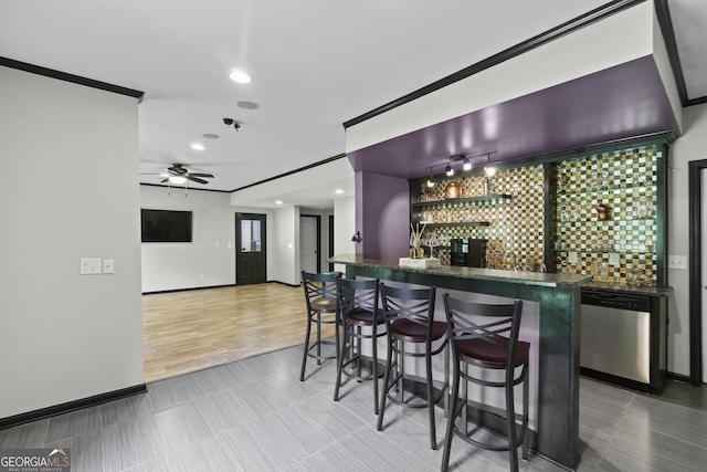 8275 Majors Ridge Way, Cumming, GA 30041 - indoor wet bar with stainless steel dishwasher, recessed lighting, baseboards, ceiling fan, and tile patterned flooring