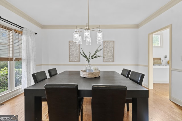 8275 Majors Ridge Way, Cumming, GA 30041 - dining room with ornamental molding, wood finished floors, and a chandelier