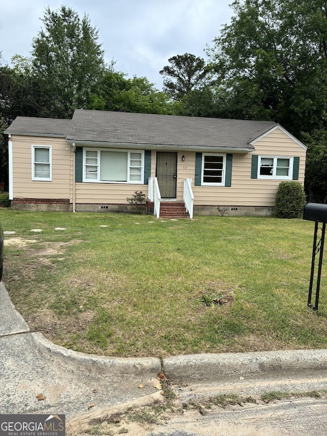513 Lynmore Cir, Macon, GA 31206 - single story home featuring roof with shingles, a front yard, and crawl space