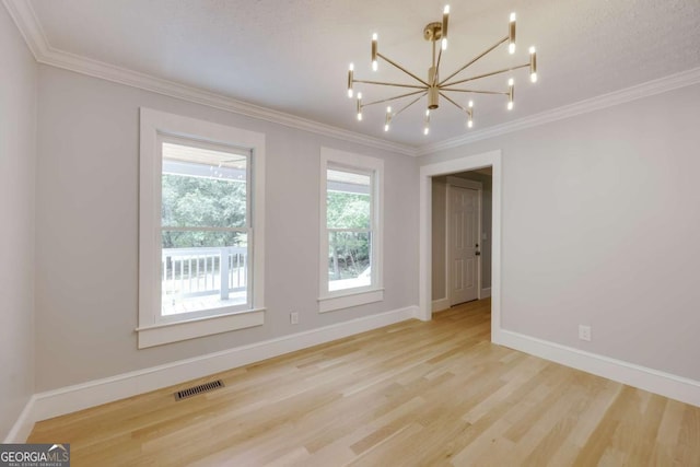 155 Hunters Pointe Dr, Athens, GA 30606 - spare room featuring a chandelier, visible vents, wood finished floors, and crown molding