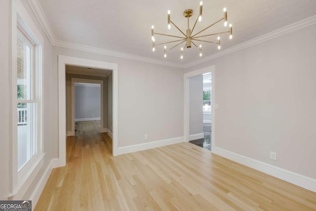 155 Hunters Pointe Dr, Athens, GA 30606 - empty room with a chandelier, baseboards, light wood-style floors, and crown molding