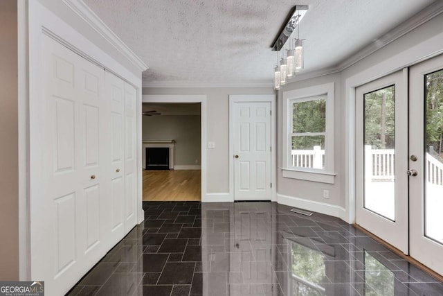 155 Hunters Pointe Dr, Athens, GA 30606 - unfurnished dining area with a textured ceiling, french doors, crown molding, and baseboards