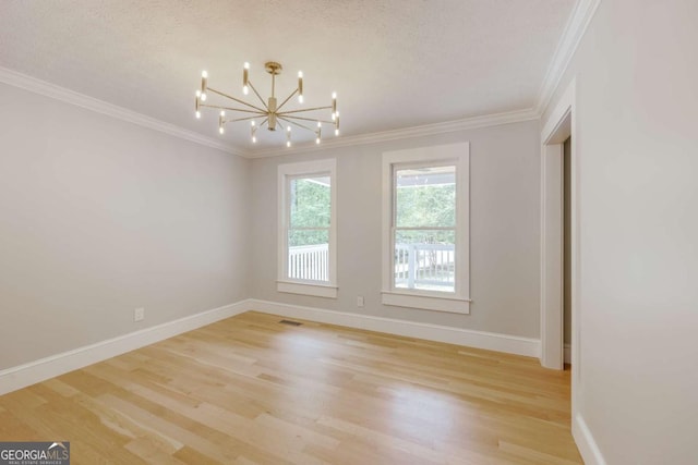 155 Hunters Pointe Dr, Athens, GA 30606 - unfurnished room featuring a chandelier, baseboards, light wood-style floors, and crown molding