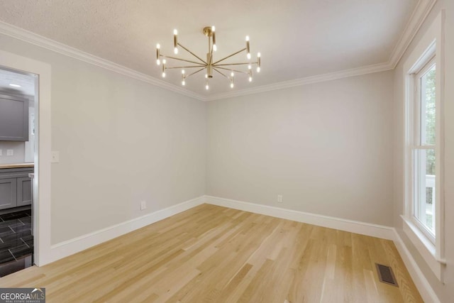 155 Hunters Pointe Dr, Athens, GA 30606 - interior space with crown molding, an inviting chandelier, visible vents, and light wood-style floors
