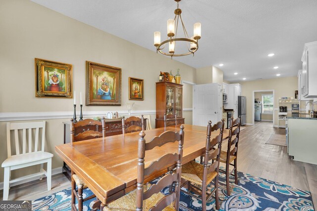 1703 Windsor Rd, Statesboro, GA 30461 - dining space featuring a chandelier, light wood-style floors, and recessed lighting