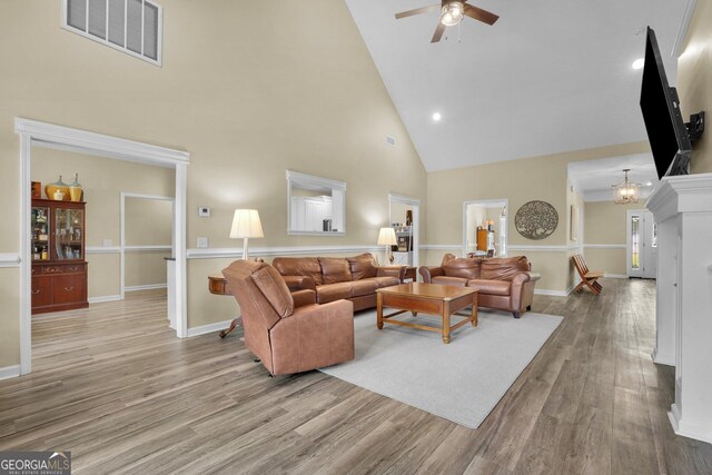 1703 Windsor Rd, Statesboro, GA 30461 - living room featuring high vaulted ceiling, a ceiling fan, wood finished floors, and recessed lighting