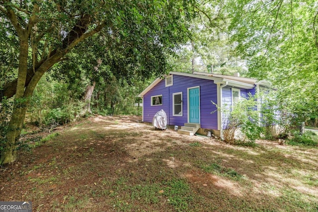 view of outbuilding featuring entry steps