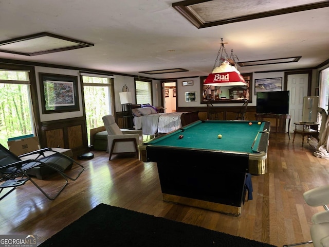 game room with wood finished floors, pool table, and a healthy amount of sunlight