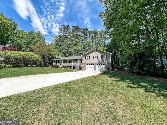 3075 Nuthatch Ct NW, Kennesaw, GA 30144 - tri-level home featuring an attached garage, a front lawn, driveway, and a porch