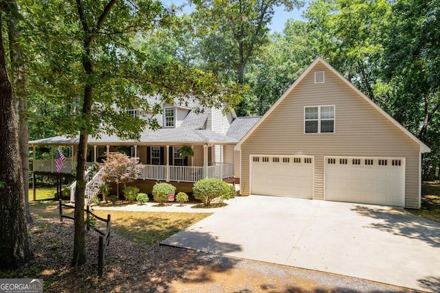 112 Hightower Rd, Hiram, GA 30141 - view of front of house with roof with shingles, covered porch, concrete driveway, and a garage