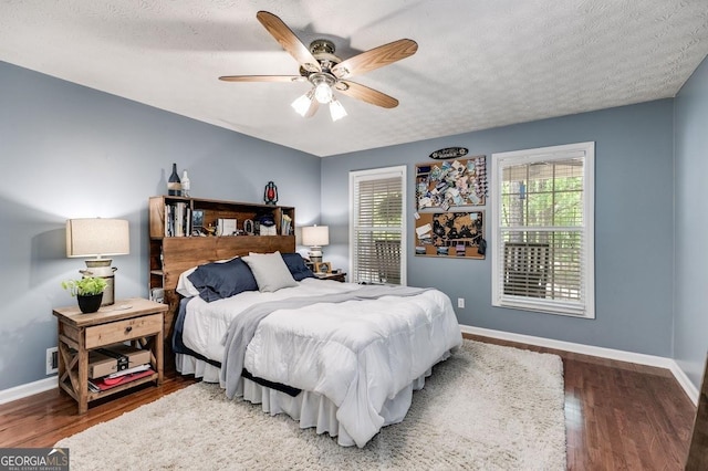 112 Hightower Rd, Hiram, GA 30141 - bedroom with baseboards, wood finished floors, and a textured ceiling