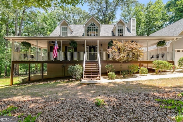 112 Hightower Rd, Hiram, GA 30141 - farmhouse inspired home featuring a porch, a shingled roof, stairway, and a chimney